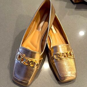 Never worn. Franco sarto chrome gold loafers